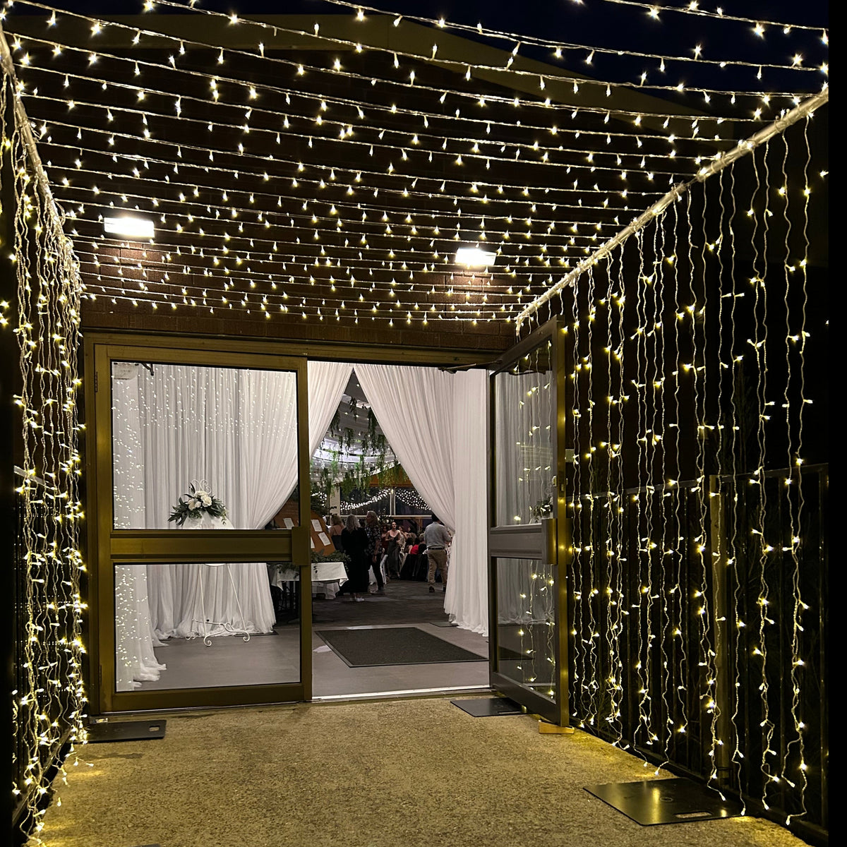 Warm fairy light tunnel hire Fairytale Events Pty Ltd