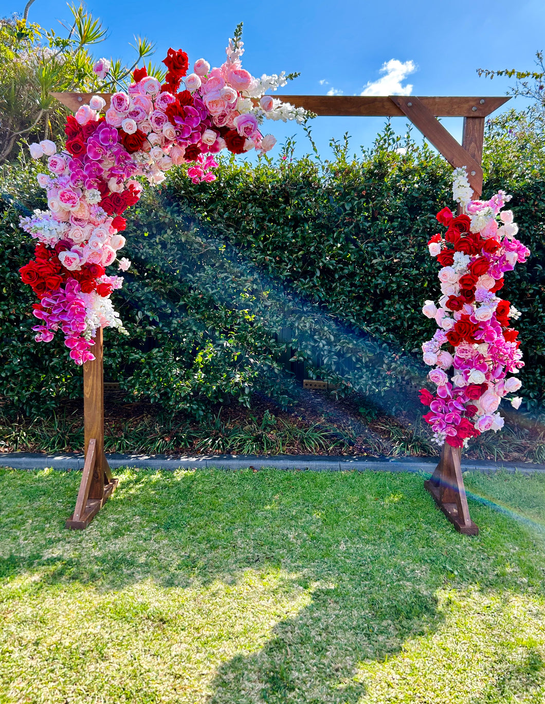 Lola floral on wooden arbour