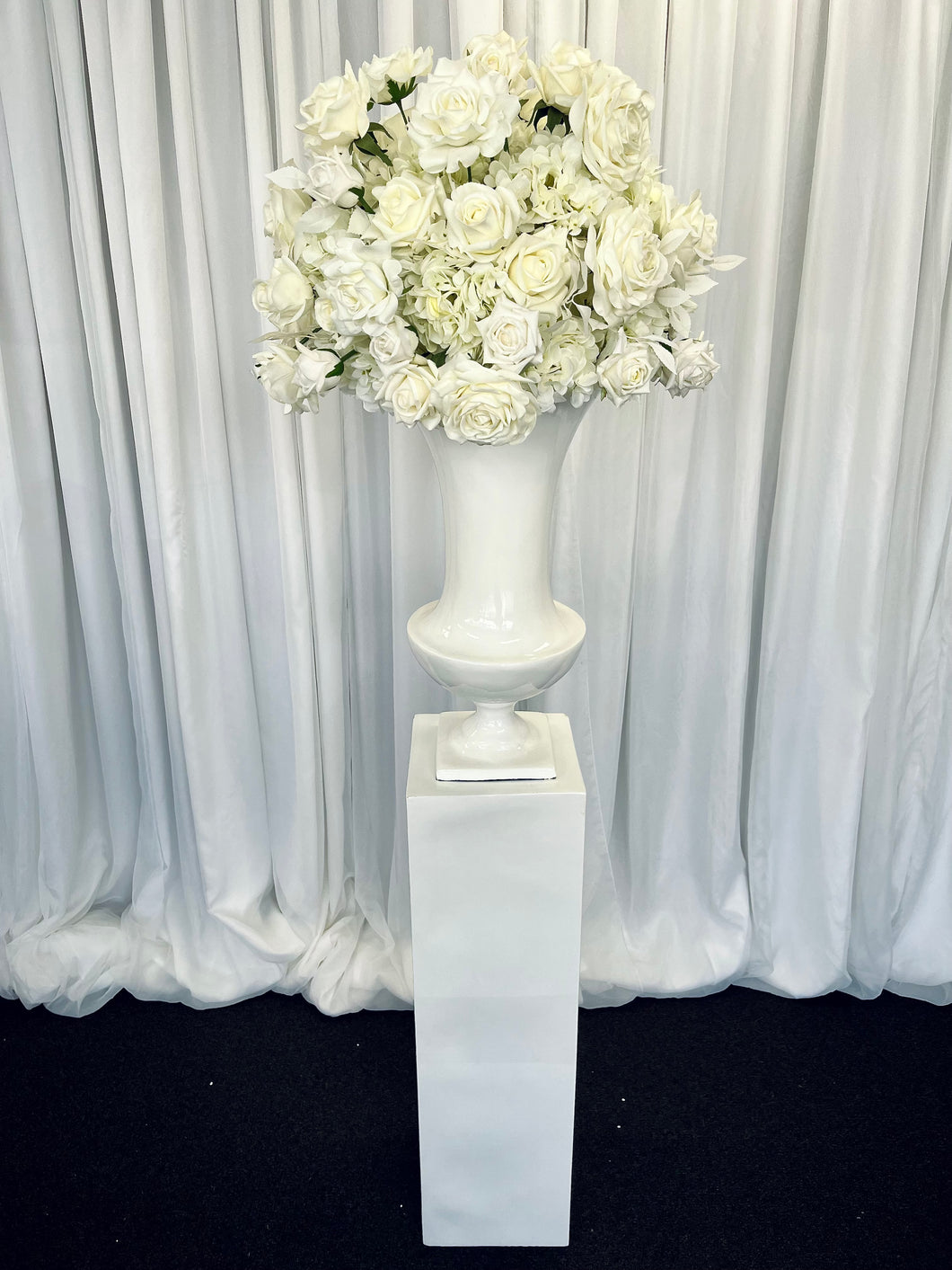 Rectangle plinth with slimline urn & Eve floral