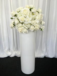 White round cylinder plinth with Eve floral