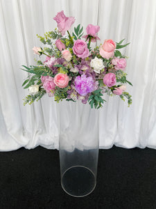 Clear round cylinder plinth with Esther floral