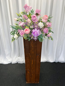 Rustic wooden plinth with Esther floral