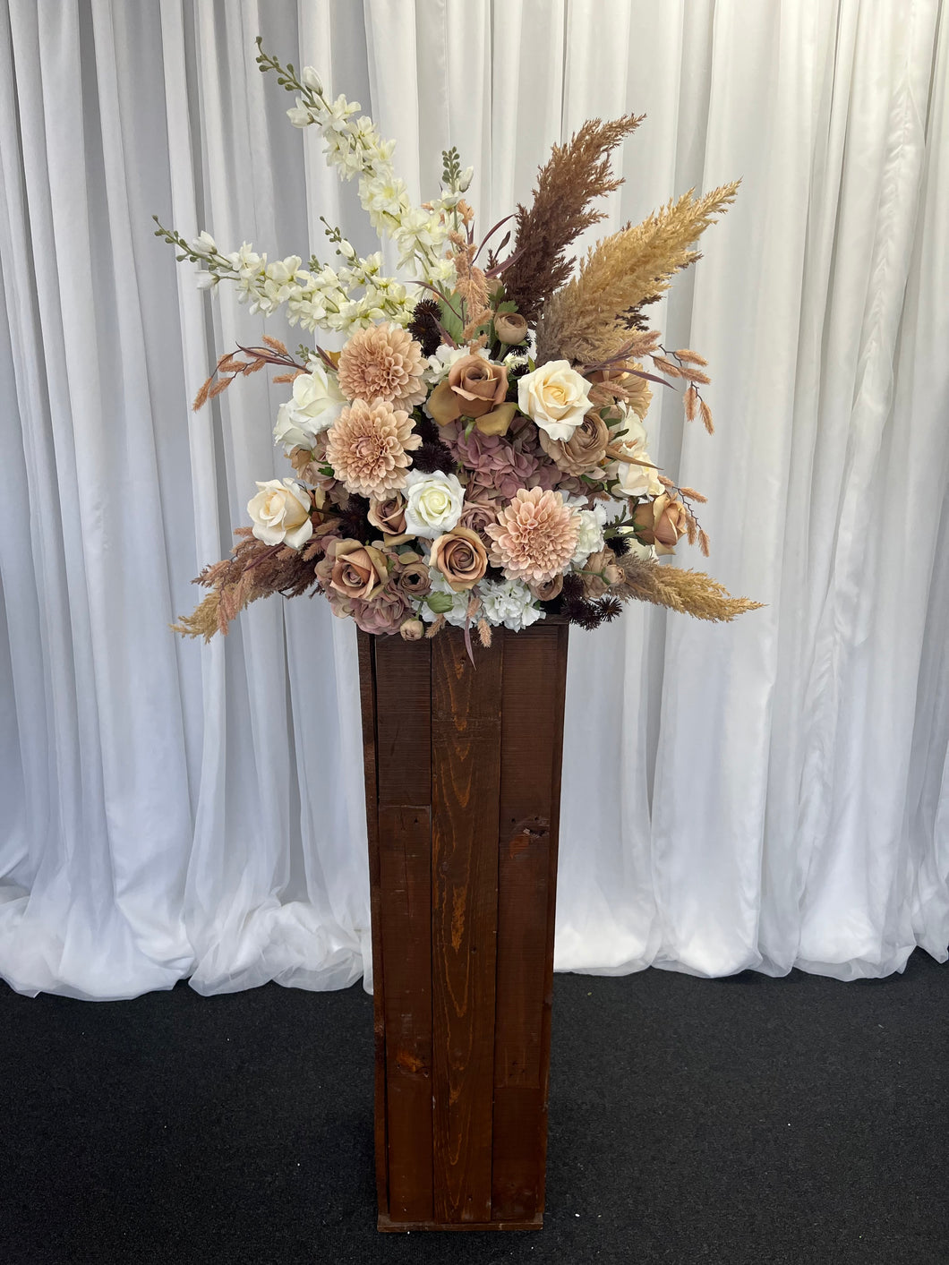 Rustic wooden plinth with Elizabeth floral