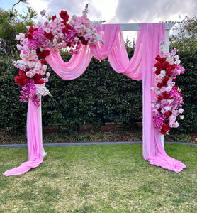 Lola floral on white arbour with pink or white drape