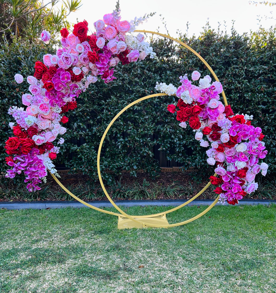 Lola floral on double gold circle arbour