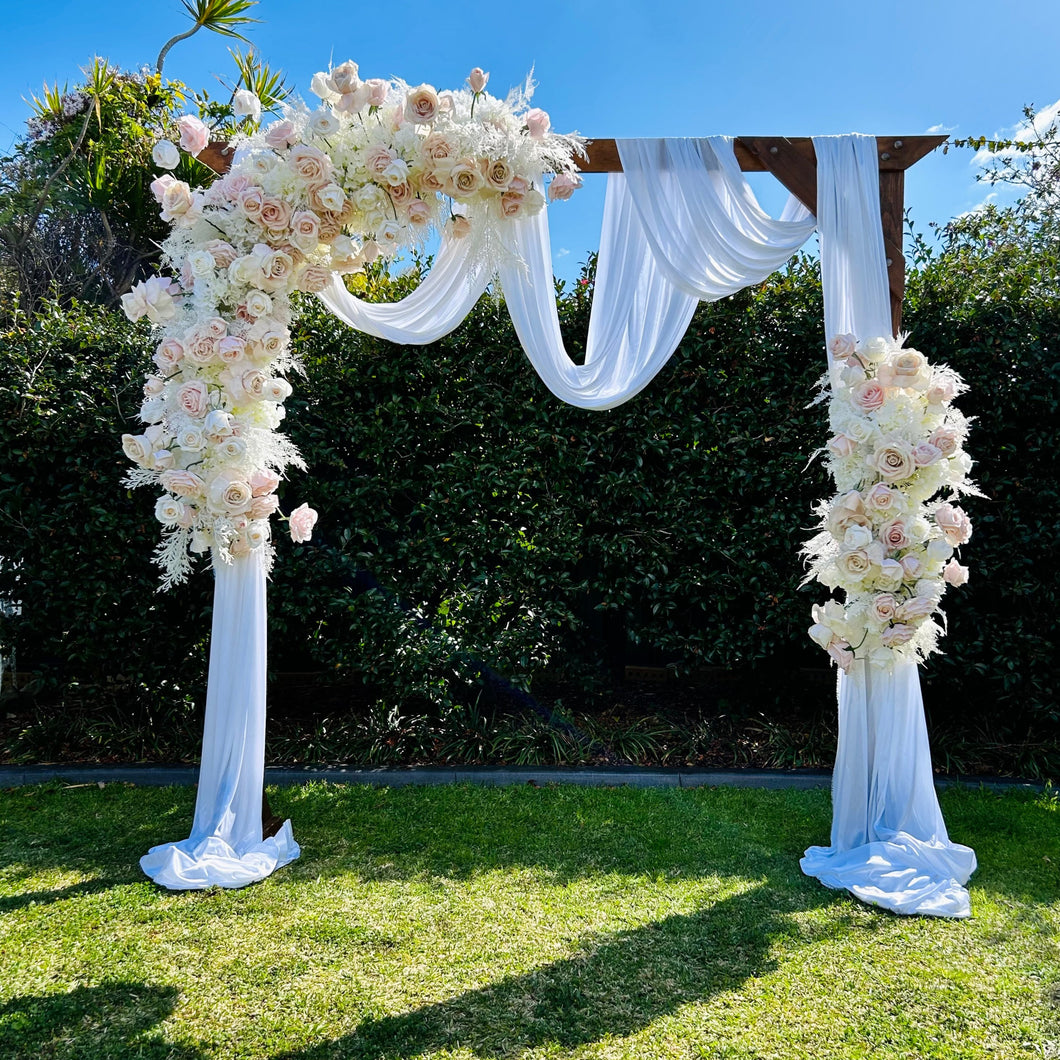 Alanah floral on wooden arbour with drape
