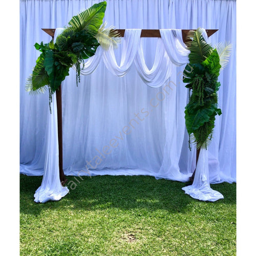 Tropical Leaf On Wooden Arbour With Drape