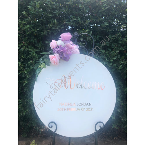White Round Sign With Esther Floral On White Easel