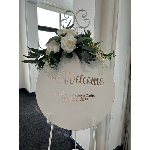 White Round Sign With Sarah Floral On White Easel